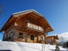 Almwelt Austria Chaletový svět - skiopeningubytovani